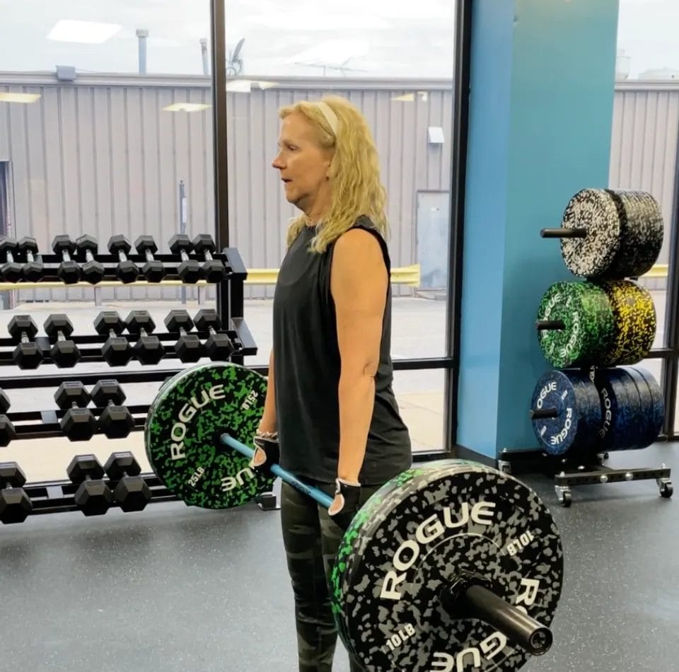 Moonwalk Fitness Woman doing a Deadlift